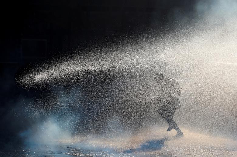 Ảnh ấn tượng tuần (17-23/10): Tổng thống Nga thúc đẩy chiến dịch ở Ukraine, UAV tấn công Kiev, binh sĩ ẩn nấp, Trung Quốc bế mạc Đại hội XX