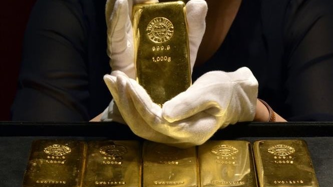 Giá vàng hôm nay 18/12, Giá vàng phát tín hiệu lẫn lộn, thị trường chưa ‘tiêu hóa’ hết thông điệp từ Fed, vàng vẫn là thiên đường an toàn