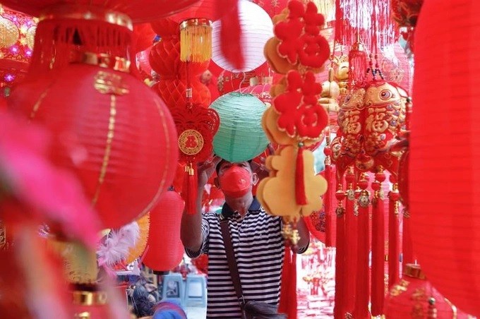 Người châu Á tất bật chuẩn bị đón Tết Quý Mão 2023 Người châu Á tất bật chuẩn bị đón Tết Quý Mão 2023