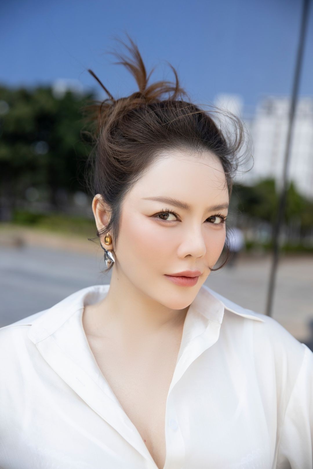 Lý Nhã Kỳ tái xuất trẻ trung tại sự kiện của Mr. Đàm