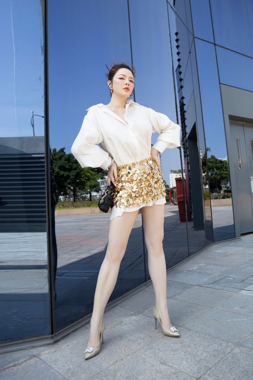 Lý Nhã Kỳ tái xuất trẻ trung tại sự kiện của Mr. Đàm