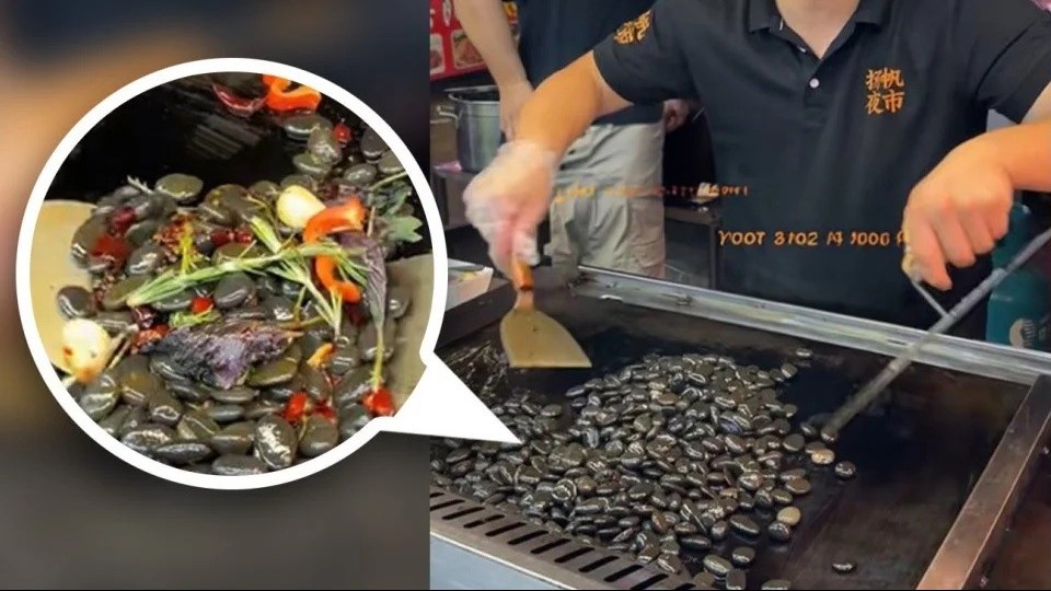 Trung Quốc: Cộng đồng mạng 'phát sốt' với món ăn chế biến bằng những viên sỏi đá xào ớt