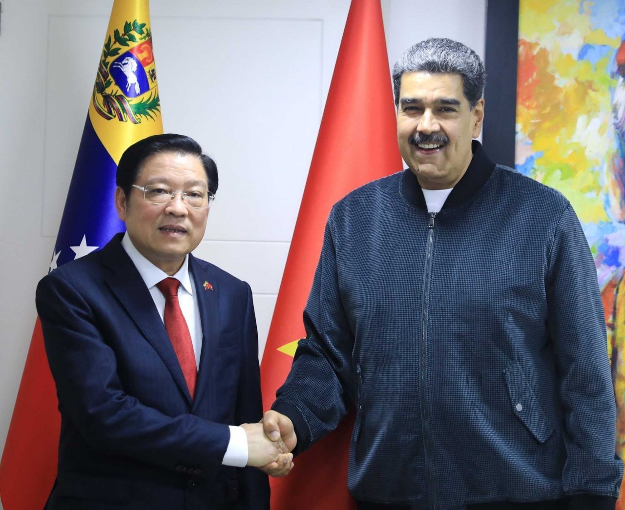 Đồng chí Phan Đình Trạc hội kiến Chủ tịch Đảng PSUV, Tổng thống Venezuela Nicolás Maduro. (Nguồn: TTXVN) Đồng chí Phan Đình Trạc hội kiến Chủ tịch Đảng PSUV, Tổng thống Venezuela Nicolás Maduro. (Nguồn: TTXVN)