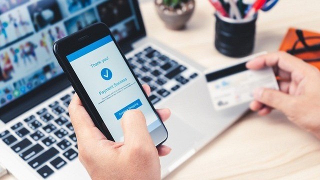 Hà Nội: Phấn đấu mục tiêu 100% người dân đang hưởng trợ cấp ưu đãi nhận chi trả không dùng tiền mặt qua tài khoản