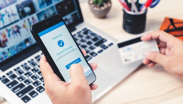 UBND TP. Hà Nội phát động tháng cao điểm tập trung tuyên truyền, vận động, khuyến khích người dân thực hiện đăng ký tài khoản để thực hiện chi trả không dùng tiền mặt. (Nguồn: Đảng Cộng sản) UBND TP. Hà Nội phát động tháng cao điểm tập trung tuyên truyền, vận động, khuyến khích người dân thực hiện đăng ký tài khoản để thực hiện chi trả không dùng tiền mặt. (Nguồn: Đảng Cộng sản)