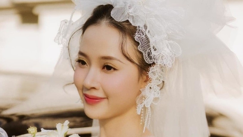 Hình ảnh Midu mặc váy cưới, xinh đẹp tỏa sáng dưới nắng hoàng hôn