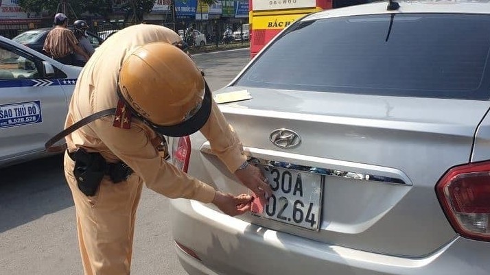 Sử dụng biển số xe giả tham gia giao thông bị phạt thế nào?