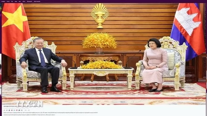 Trang tin EAC News ngày 13/7 đăng bài viết đưa tin về cuộc gặp giữa Chủ tịch nước Tô Lâm và Chủ tịch Quốc hội Campuchia Khuon Sudary. (Ảnh chụp màn hình) Trang tin EAC News ngày 13/7 đăng bài viết đưa tin về cuộc gặp giữa Chủ tịch nước Tô Lâm và Chủ tịch Quốc hội Campuchia Khuon Sudary. (Ảnh chụp màn hình)