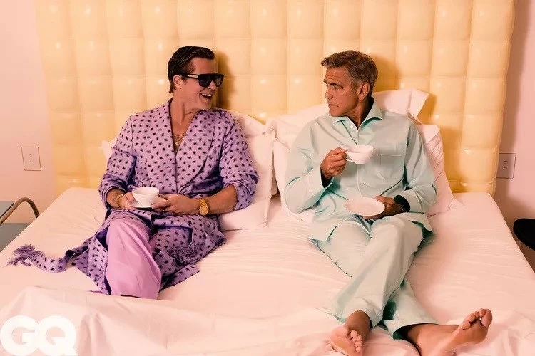 Brad Pitt và George Clooney Brad Pitt và George Clooney