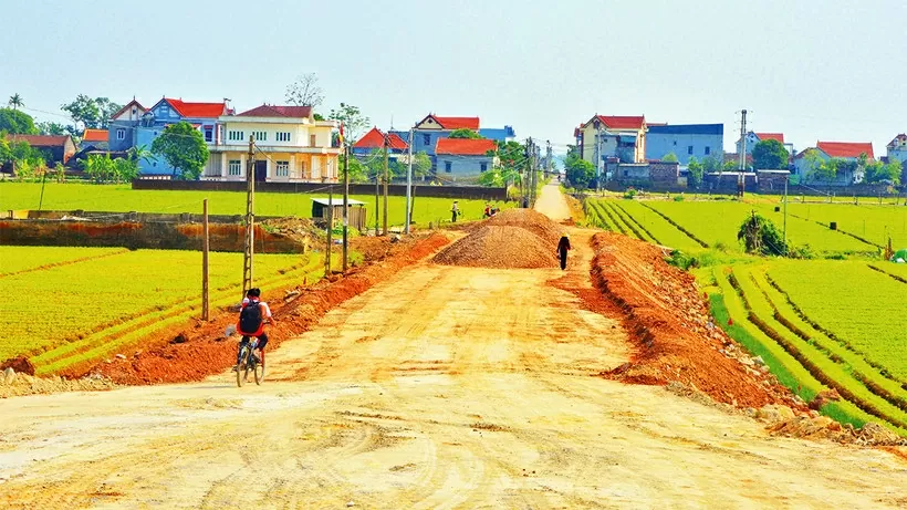 Mở rộng đường làng tại xã Cao Ðức, huyện Gia Bình, Bắc Ninh. (Nguồn: Nhân dân) Mở rộng đường làng tại xã Cao Ðức, huyện Gia Bình, Bắc Ninh. (Nguồn: Nhân dân)