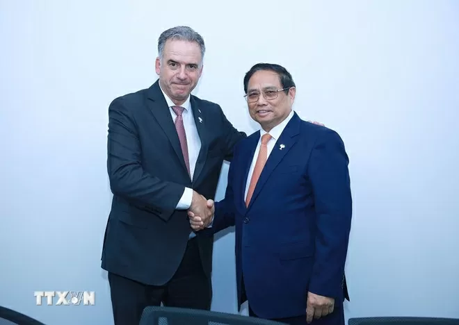 undefined Thủ tướng Phạm Minh Chính gặp Tổng thống Uruguay Yamandú Orsi. (Nguồn: TTXVN)