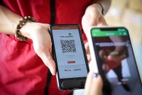 Vietcombank và J&T Express phối hợp ứng dụng QR động trong thanh toán đơn hàng