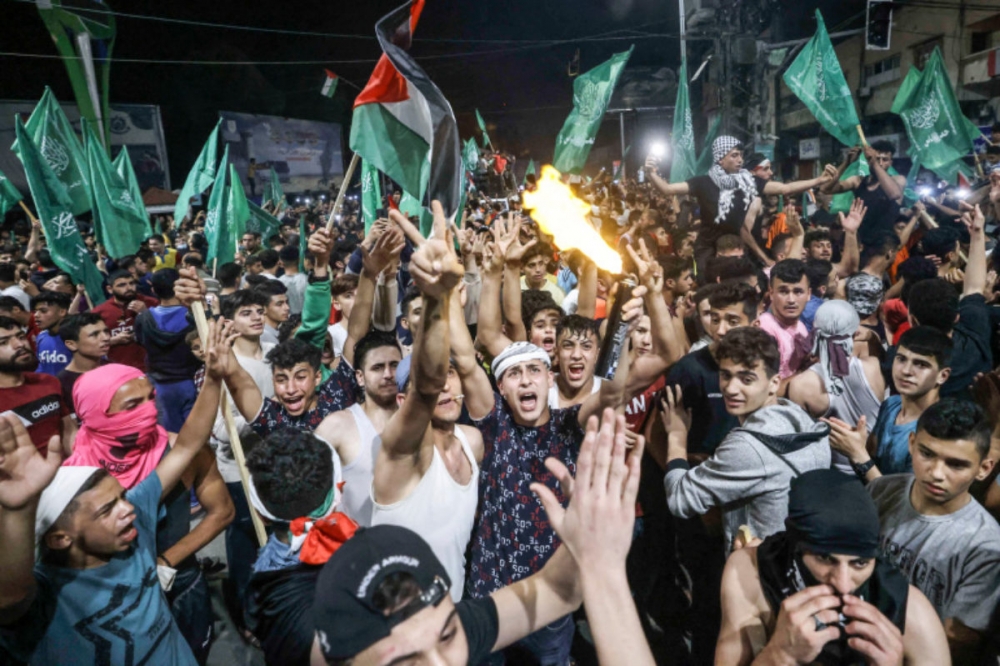 Lệnh ngừng bắn ở Dải Gaza: Hamas tuyên bố chiến thắng; Ngoại trưởng Mỹ sắp sang Trung Đông và dư luận quốc tế. (Nguồn: AFP)