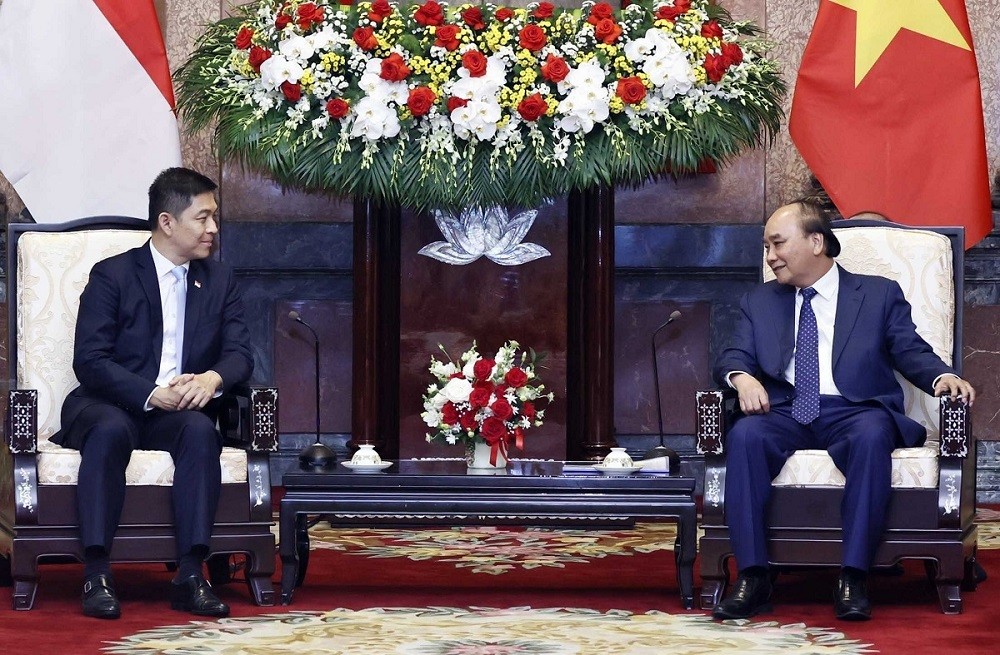 Chiều 19/5/2022, tại Phủ Chủ tịch, Chủ tịch nước Nguyễn Xuân Phúc tiếp Chủ tịch Quốc hội Cộng hòa Singapore Tan Chuan-Jin. (Nguồn: TTXVN)