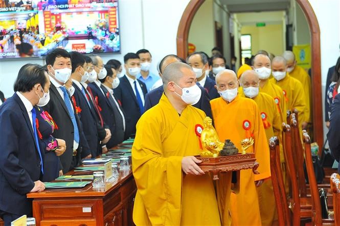 Trong ảnh: Nghi thức cung nghênh tại buổi lễ. (Nguồn: TTXVN)