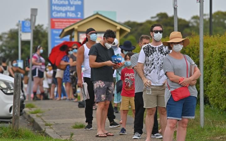People line up for a Covid-19 coronavirus testing at Mona Vale Hospital in Sydney. Photo: AFP People line up for a Covid-19 coronavirus testing at Mona Vale Hospital in Sydney. Photo: AFP
