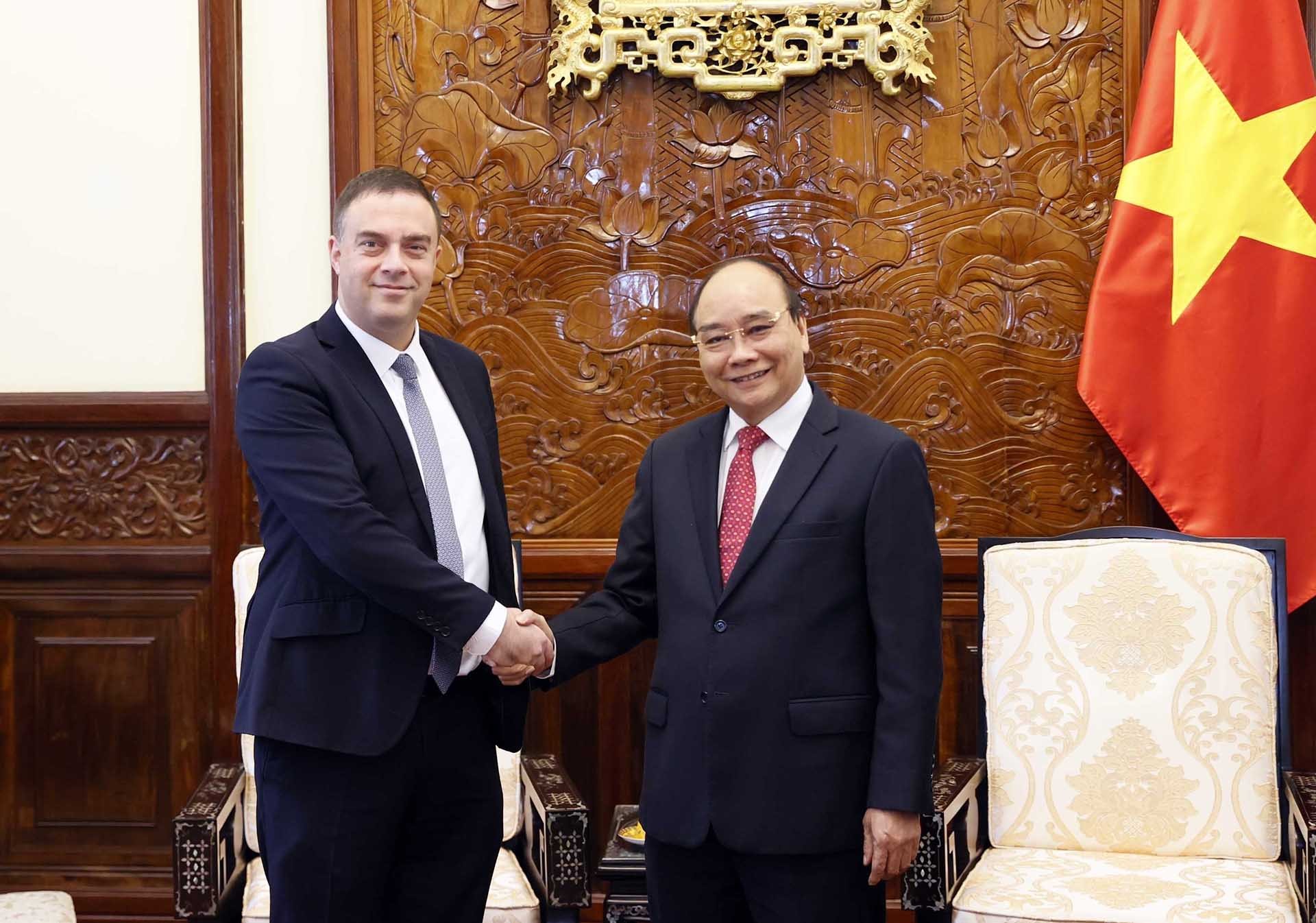 Chủ tịch nước Nguyễn Xuân Phúc tiếp Đại sứ Israel Nadav Eschar. (Nguồn: TTXVN)