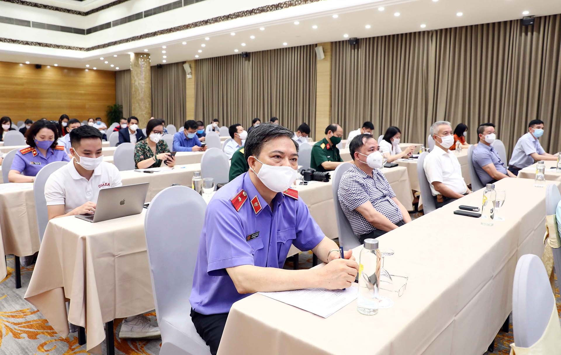 Các đại biểu tham dự cuộc họp báo công bố Quyết định đặc xá năm 2021 của Chủ tịch nước. (Nguồn: TTXVN)