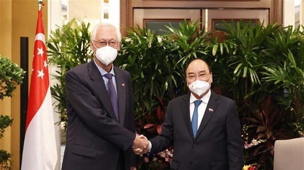 Chủ tịch nước Nguyễn Xuân Phúc tiếp nguyên Thủ tướng Singapore Goh Chok Tong và Bộ trưởng cao cấp Tiêu Chí Hiền