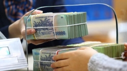 Tiền gửi ngân hàng tăng chậm lại, thanh khoản chưa đáng lo