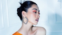 Lương Thùy Linh đẹp lạ cùng đầm sắc màu