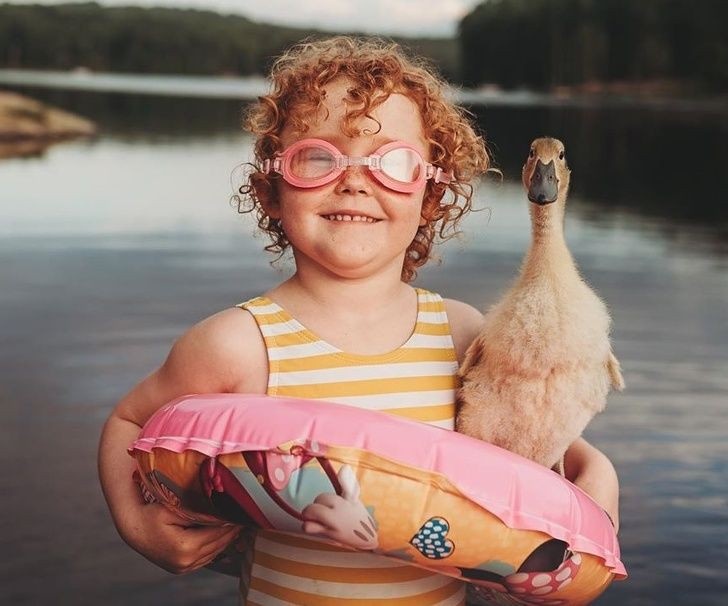 tan chay voi bo anh tuyet dep ve tre em ben thu cung