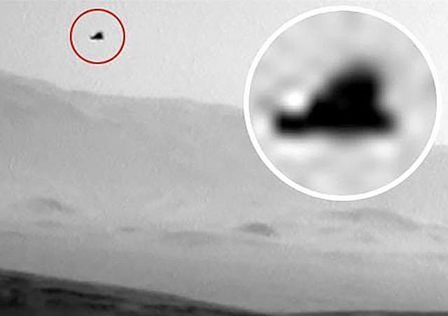 nasa chup duoc hinh anh sinh vat bi an co canh bay tren sao hoa