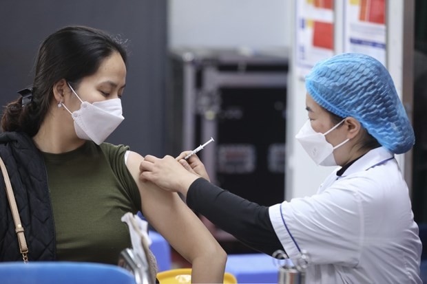 Tiêm phòng vaccine phòng Covid-19 cho người dân. (Nguồn: Vietnam+) Tiêm phòng vaccine phòng Covid-19 cho người dân. (Nguồn: Vietnam+)