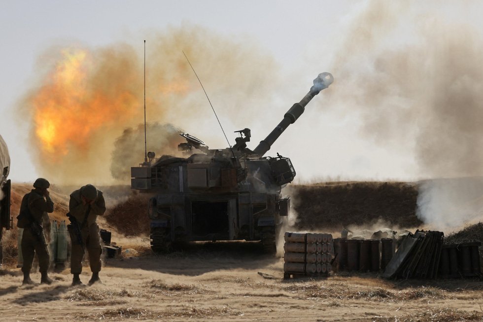 Pháo 155mm của quân đội Israel khai hỏa vào các khu vực của Hamas. (Nguồn: AFP) Pháo 155mm của quân đội Israel khai hỏa vào các khu vực của Hamas. (Nguồn: AFP)