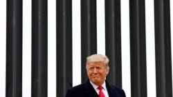 Ảnh ấn tượng tuần (11-17/1): Đồi Capitol ‘căng hơn dây đàn’ trước giờ G, Triều Tiên khoe sức mạnh quân sự và kỷ lục buồn của ông Trump