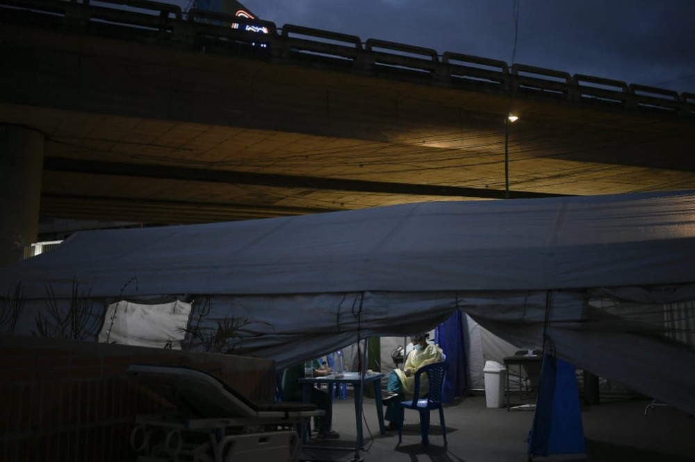 Ảnh ấn tượng tuần (29/3-4/4): Tình hình Myanmar, chiến sự Syria, nước mắt Covid-19 và lời cam kết của Tổng thống Mỹ