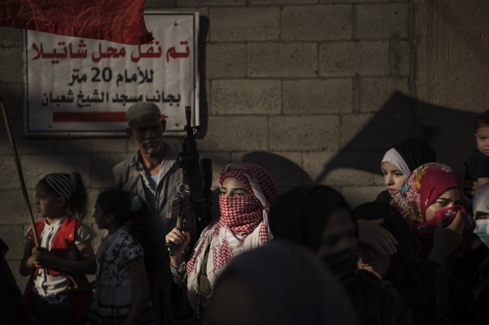 Ảnh ấn tượng tuần 31/5-6/6: Trò chơi trốn tìm ở Dải Gaza; Tổng thống Putin nói có động cơ chính trị khi cấm vaccine Sputnik V và ông Biden đi xe đạp