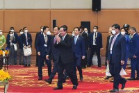 Toàn cảnh Bộ trưởng Ngoại giao Bùi Thanh Sơn dự khai mạc AMM-55 qua ảnh